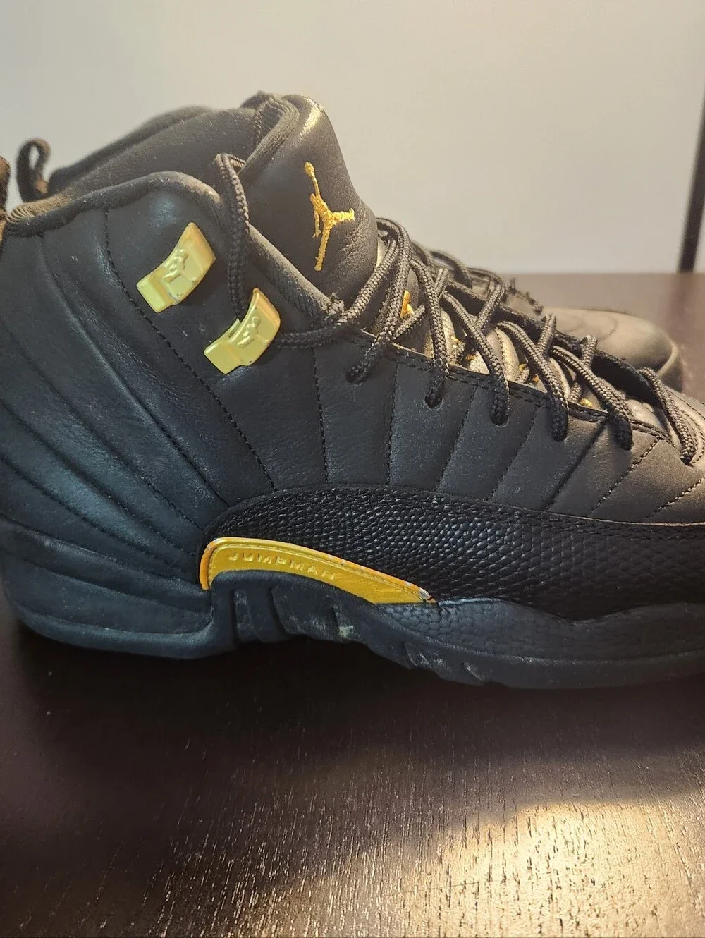 Jordan 13 Black and Gold High-Top Athletic Basketball Shoes.  See Pictures
